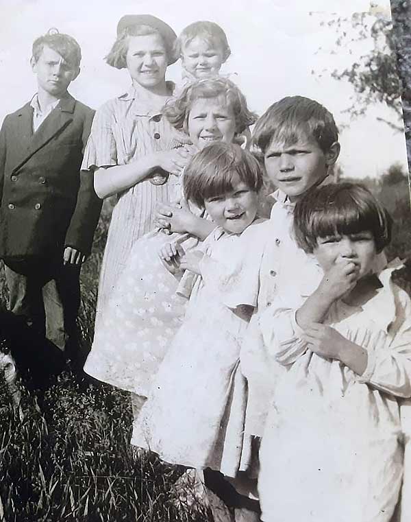 Rosie Johnson with siblings at 14 in 1937 Left to right: Vic Jr., Rosie, Betty, Mary, Joyce, Fred, Loretta