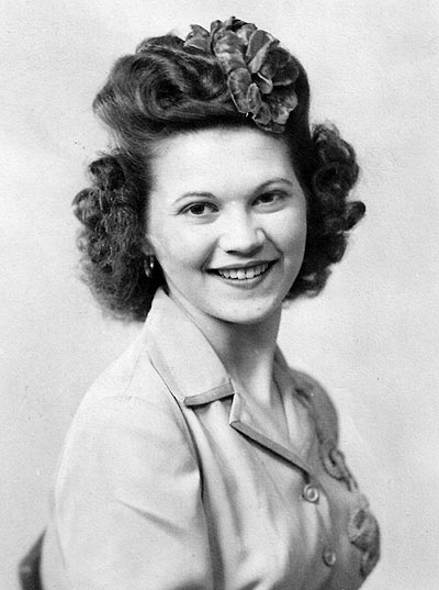 Rosie Johnson in 1944, in a studio portrait taken to send to Bob Harrigan who was fighting the Japanese in the Philippines.