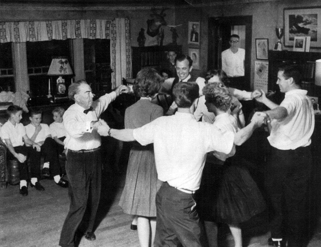 Every other Saturday the Johnson family would host indoor square dances by kerosene lamp light, with up to two dozen dancers square dancing to live music of the concertina played by Mark Short.